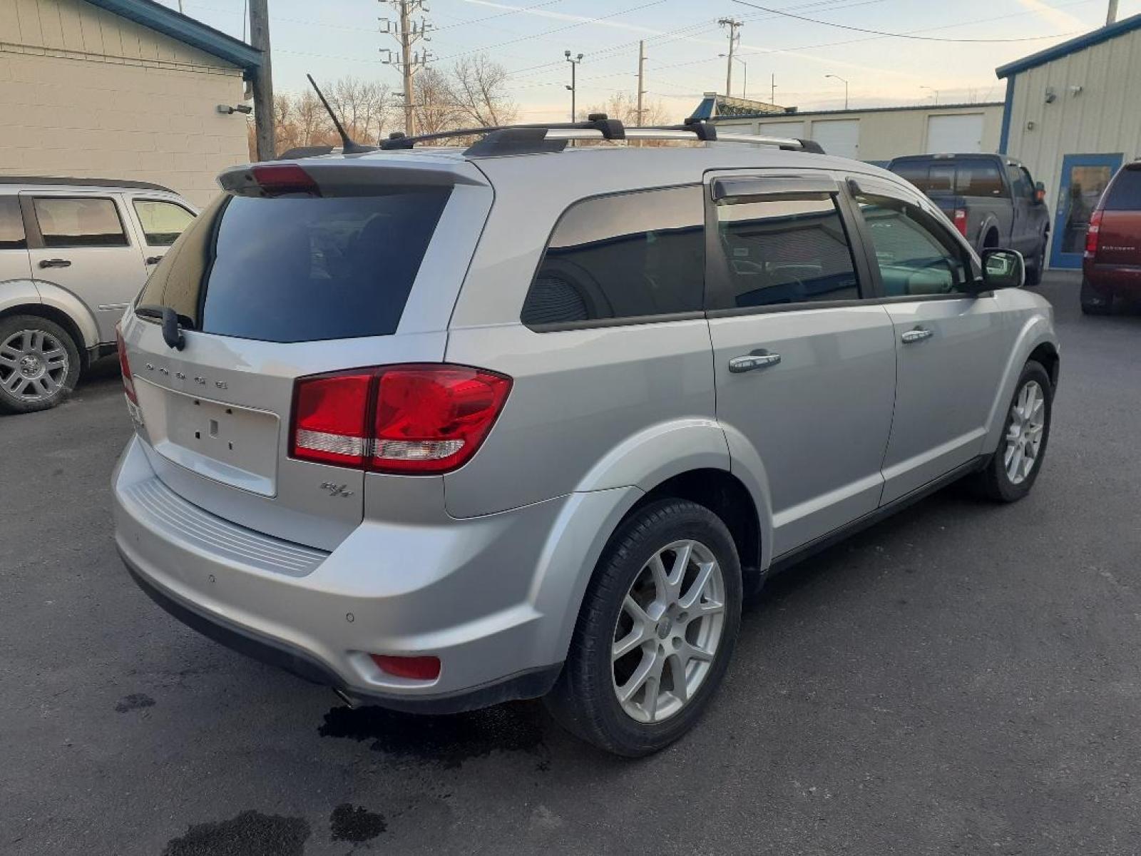 2013 Dodge Journey (3C4PDDFGXDT) with an 3.6L V6 DOHC 24V engine, 6-Speed Automatic transmission, located at 2015 Cambell Street, Rapid City, SD, 57701, (605) 342-8326, 44.066433, -103.191772 - CARFAX AVAILABLE - Photo #4